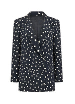 The Mariquita Everyday Blazer by Blaze Milano is a chic black blazer with white polka dots, a classic notched lapel, and long sleeves for timeless style.