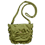 The Kidiwi Mimosa Smocked Shoulder Bag is a small green satin purse with ruffled edges, a long strap, and a flap adorned with three tiny pink beads—featured in our winter 2025 collection.