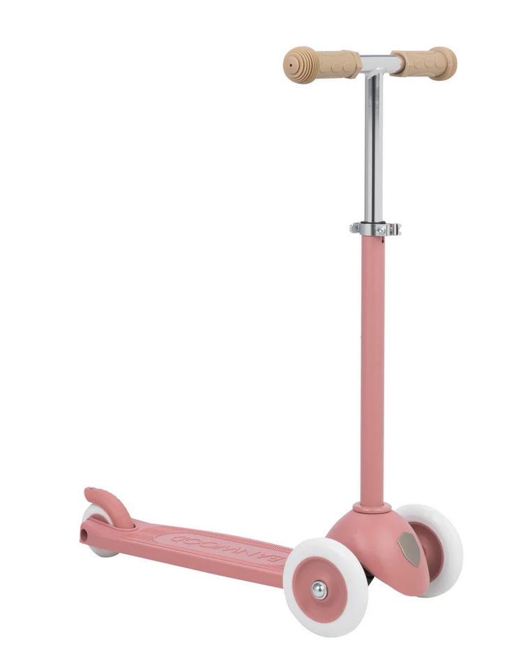 The Banwood Eco Scooter, part of the Eco Collection, is a pink three-wheeled scooter with beige handlebars and white recycled plastic wheels, shown on a white background.