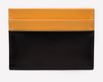 The Ettinger Bridle Flat Credit Card Case features a two-tone bridle hide leather design with a yellow upper section, black lower section, and visible stitching.