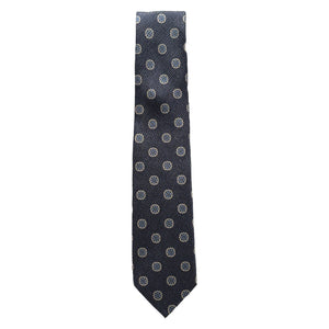 The Robert Jensen Starburst Tie is a navy silk tie, hand-stitched in Italy, featuring evenly spaced white circular dots.