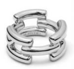 The Emily Ring by Lie Studio features interconnected curved bars in two parallel rows, creating a chunky silver statement piece.