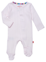 The Baby Love Lines Pointelle Footie by Magnetic Me is a pink onesie made from soft organic cotton, featuring long sleeves, foot coverings, and a multicolored striped neckline—a true baby wardrobe staple.