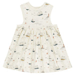 The Rylee & Cru Baby Girls' & Girls' Layla Dress is a sleeveless white cotton jersey babydoll, featuring a nautical sailboats, lighthouses, waves, and seagulls print in soft blue, red, and beige tones.