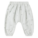 The Quincy Mae Baby Boys' Woven Pant features a light gray fabric, elastic waistband and cuffs, and a subtle pattern of small outlined stars.