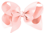 The Milledeux Girls' Large Boutique Bow features textured light pink fabric, handmade and neatly tied, shown on a white background.