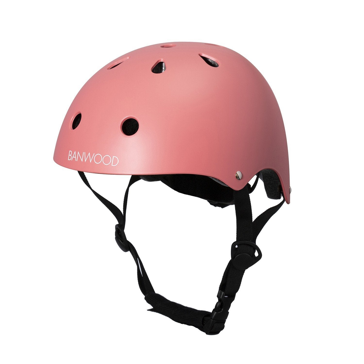 The Banwood Children’s Helmet in pink is displayed against a white background, featuring ventilation holes, a protective inner foam layer, and an adjustable chin strap.