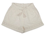 Early Sunday's Girls' Roman Shorts feature a white lace design with an elastic waistband, drawstring tie, and decorative tassels. The scalloped hem displays a lacy pattern crafted from a breezy cotton-linen blend.