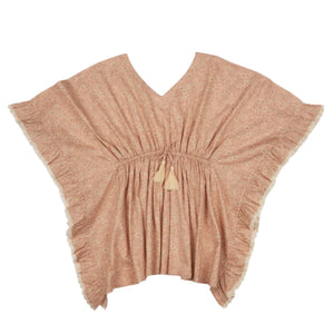 Girls' Tony Kaftan by Early Sunday: A pink floral poncho featuring a V-neck, ruffled edges, and cinched waist with tassels, crafted from soft cotton cambric for a garden flower print look.