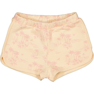 The Girls' Georgia Short by Louis Louise features a beige cotton design with a light pink tropical palm tree and floral print. They include an elasticated waist, side pockets, and curved hems for added comfort and style.