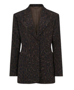 The Simba Daisy Blazer by Blaze Milano is a women's silk blazer in leopard print with dark brown and black tones, notched lapels, front buttons, and flap pockets.