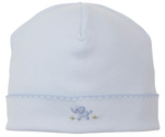 The Kissy Kissy Premier Elephant Esprit Hat with Hand Emb. is a light blue Pima cotton baby hat featuring a small hand-embroidered elephant and grass on the front, plus scalloped trim around the brim.