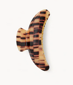 The Jumbo Heirloom Claw by Machete, crafted from Italian acetate in a brown checkered tortoiseshell design, is elegantly displayed against a white background.