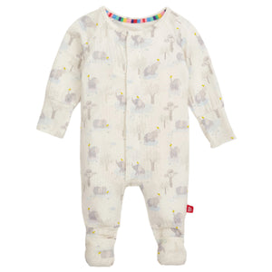 The Magnetic Me Baby Modal Convertible Coverall is a white onesie with long sleeves and feet, adorned with a gray animal pattern and yellow accents. Made from eco-friendly TENCEL™ modal, it’s soft and sustainable, ensuring ultimate comfort for your little one.