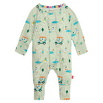 The Baby Modal Convertible Coverall by Magnetic Me is a green onesie with golf-themed prints of carts, trees, and players. It features a front zipper, colorful striped neckline, and is made from eco-friendly TENCEL™ modal for superior comfort.