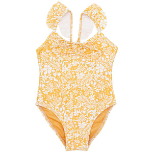 The Baby In a Cinch One-Piece Swimsuit by Feather 4 Arrow features ruffled shoulder straps, a front bow, and a yellow and white floral pattern, making it perfect for beach and pool days.