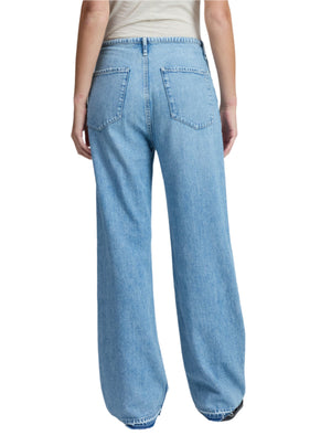 Person wearing Rag & Bone Ultra Featherweight Phoebe Drawstring Jean in Light Indigo Wash; high-waisted, wide-leg style with two back pockets, shown from the back.