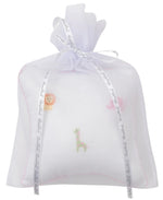 The Kissy Kissy Safari Wild Musical Pillow comes in a white tulle gift bag adorned with embroidered safari animals—lion, giraffe, and elephant—making it a charming present for baby essentials.