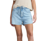 Person wearing a cream cotton knit short-sleeve top and light blue Rag & Bone Ultra Featherweight Nolan Drawstring Shorts, high-waisted with a drawstring tie at the waist.