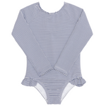 The Minnow Girls' Pacific Stripe Rashguard One Piece features navy and white stripes, long sleeves, and ruffle hip detail, shown laid flat on a white background.