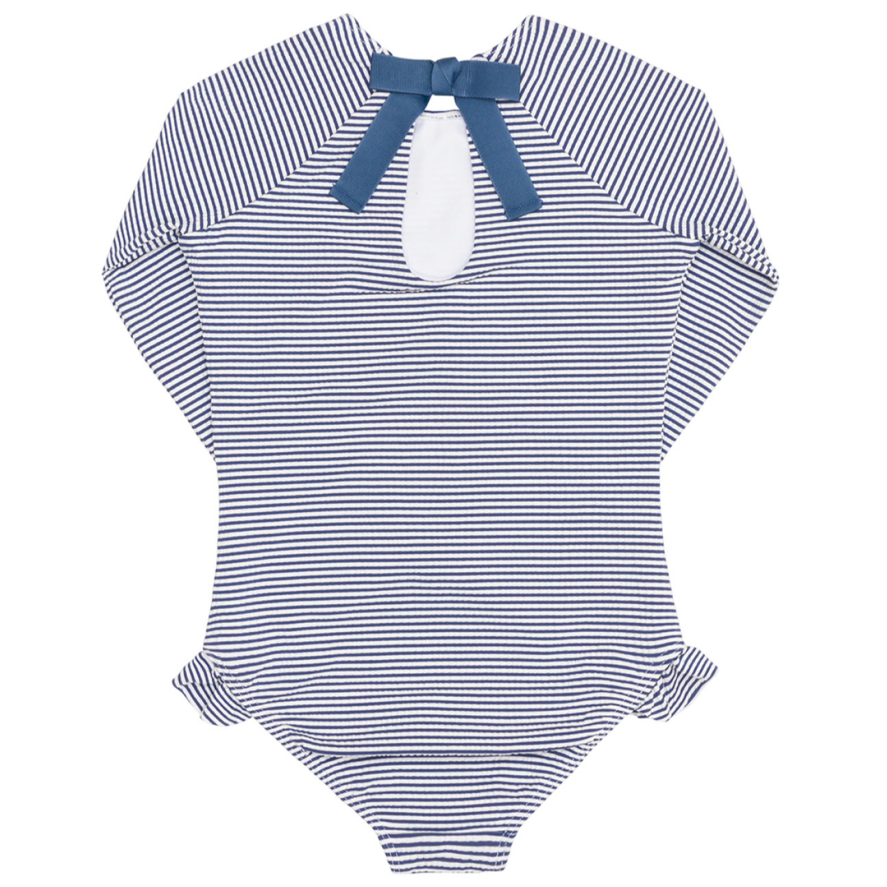 The Minnow Girls' Pacific Stripe Rashguard One Piece features long sleeves, navy and white stripes, a back keyhole opening, a navy neck bow, and cute ruffle hip accents.