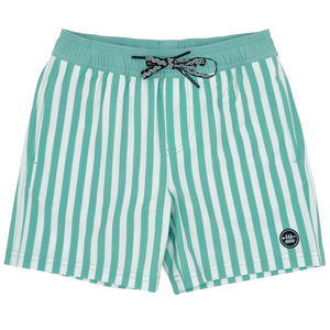 Feather 4 Arrow's Boys' Sun Club Volley Trunk features green and white vertical stripes, lightweight quick-drying fabric, an elastic waistband with a black drawstring, and a black and white circular logo patch on the lower left side.