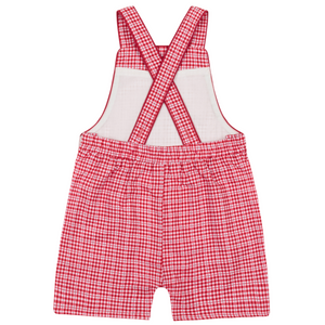 The Baby' Malibu Poppy Gingham Short Overall by Minnow features red and white checks, crisscross back straps, and an elastic waistband—a charming choice for toddlers on sunny days.
