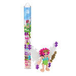 The Plus Plus Tube - Fairy features a tube labeled "Fairy" from Plus Plus, shown next to a built fairy figure made from interlocking pieces, encouraging creative play and enhancing fine motor skills.