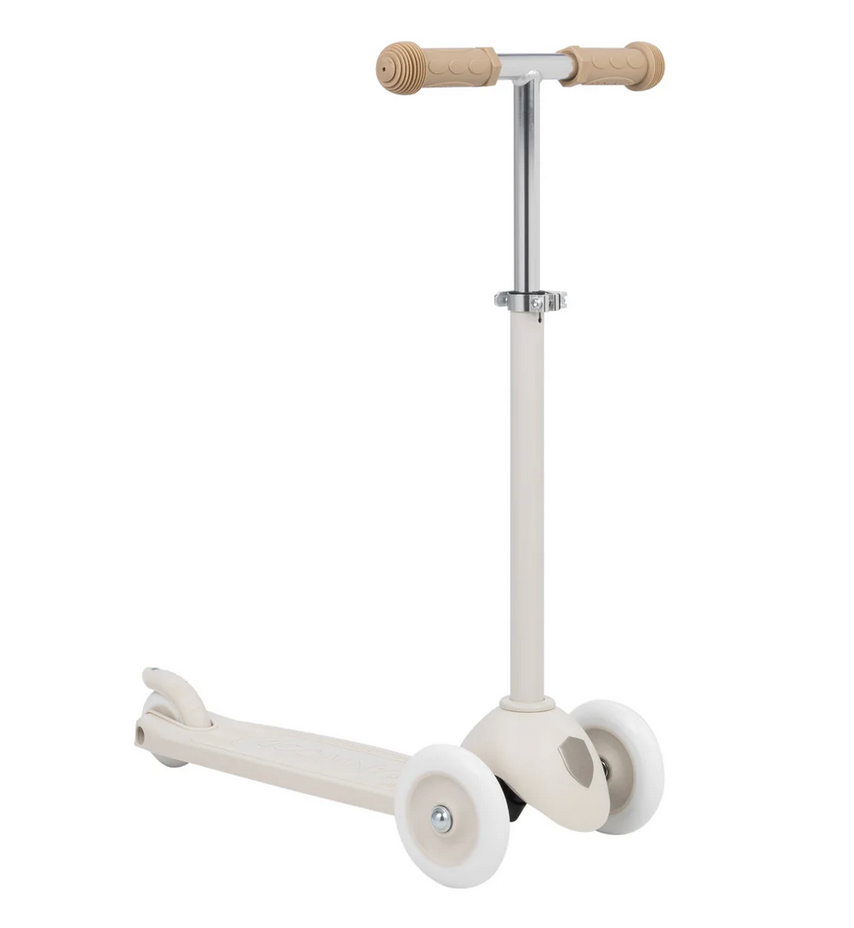 The Banwood Eco Scooter is a beige and white 3-wheel children's scooter with a handlebar, crafted from recycled plastic.