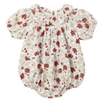 The Rylee & Cru Baby Girls' Lula Romper features short sleeves, a ruffle neck, red and beige floral print on white, and snaps at the bottom for quick changes.
