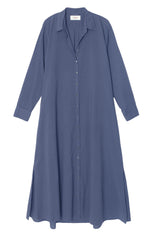 The Xirena Boden Dress is a solid blue, long-sleeve, collared button-front dress made from woven cotton poplin with side slits and a relaxed fit.