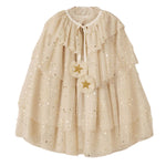 The Noralee Tulle Cape features cream-colored, tiered tulle with gold star patterns, a ruffled collar, and two flower-shaped decorations—an enchanting choice for your next party princess look.