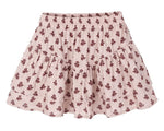 The Girls' Tiered Mini Skirt by Rylee & Cru features light pink scallop-edged tiers, an elastic waistband, and a small maroon floral print.