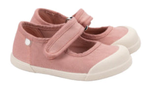 The Igor Kids' Lona Canvas Sneaker is a pink Mary Jane-style children's shoe with adjustable hook-and-loop straps, white rubber toe caps and soles, plus a removable insole for customizable comfort.
