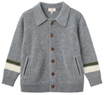 Boys’ Cashmere High School Cardigan by Copenhagen Colors—gray knit with brown buttons, two front pockets, and white-green sleeve stripes, laid flat on white background.