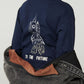 A child wears the Copenhagen Colors Boys’ To the Future Long Sleeve T-Shirt (navy, rocket graphic, “TO THE FUTURE” on back), holding a gray jacket for comfort.