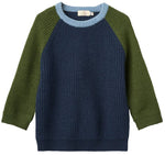 The Baby Boys’ and Boys’ Merino Ribbed Knitted Top by Copenhagen Colors features navy front/back, olive sleeves, and a light blue crew neck.