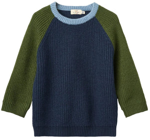 The Baby Boys’ and Boys’ Merino Ribbed Knitted Top by Copenhagen Colors features navy front/back, olive sleeves, and a light blue crew neck.