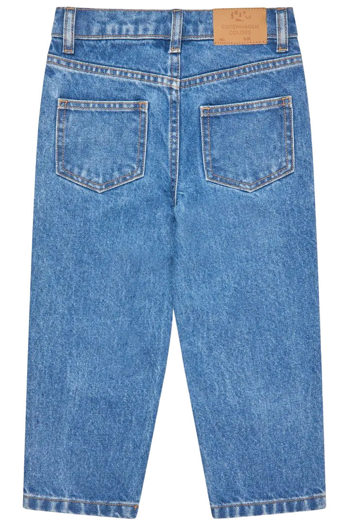 Back view of Baby Boys’ and Boys’ Organic Junior Jeans - Regular Fit in blue denim with two rear pockets, belt loops, and a brown leather Copenhagen Colors patch on the waistband.