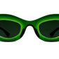 Thierry Lasry's Jazz sunglasses, featuring green oval frames with dark lenses, showcased against a white background.