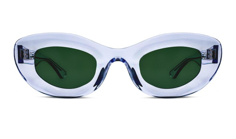 A pair of oval-shaped sunglasses with translucent frames and green lenses, part of the Thierry Lasry Jazz Sunglasses collection, viewed from the front.