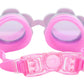 The Bling2O Flower Gardenia Moonflower Swim Goggles feature a floral-inspired design with pink frames, rhinestone accents, adjustable strap, and are shown from the back on a white background.