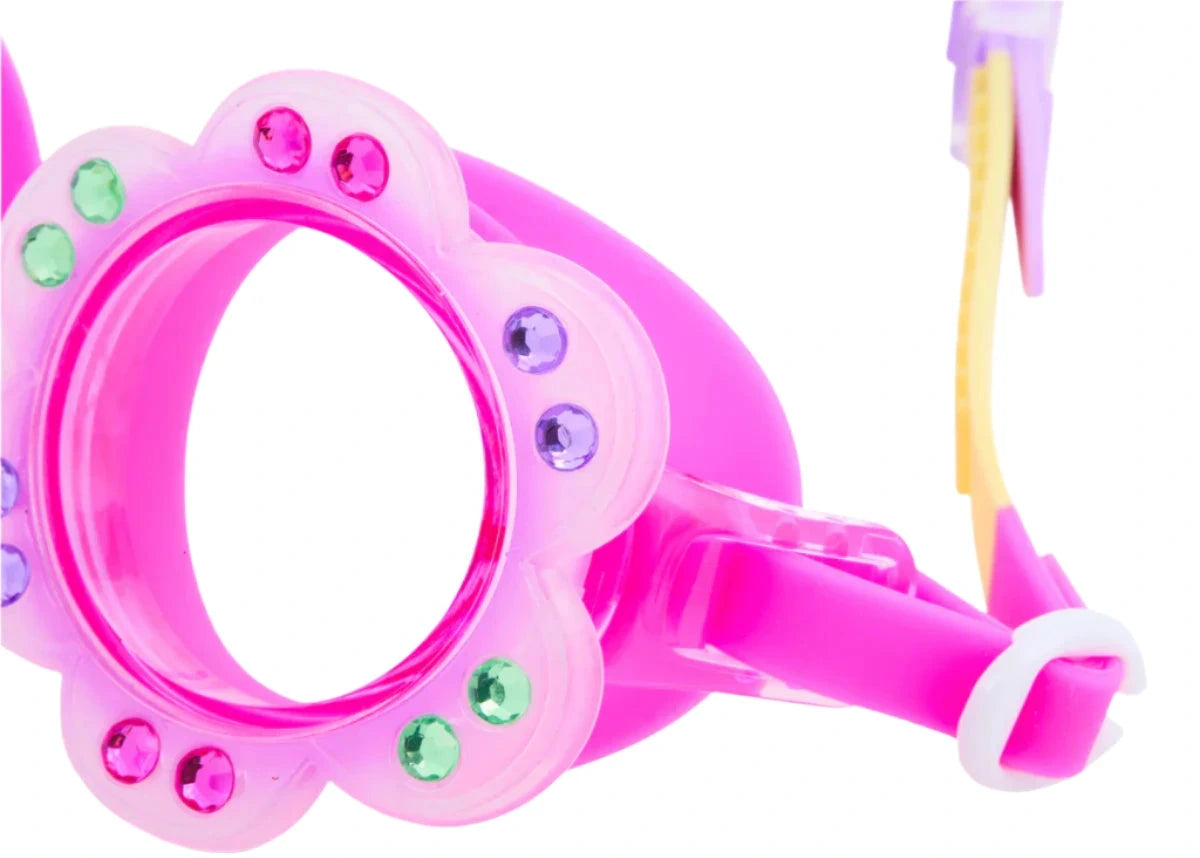Close-up of Bling2O Petals Swim Goggles featuring a pink flower-shaped frame with green, purple, and sparkling rhinestone accents for extra shine.