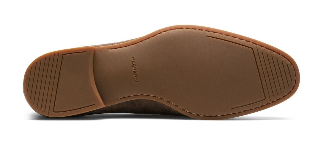 Sole of a Magnanni Lecera brown leather venetian apron toe loafer with branding visible.