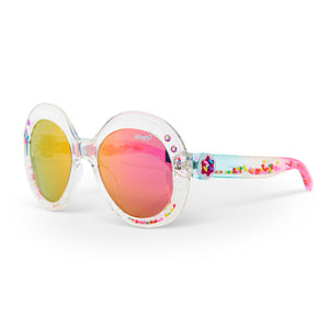 The Bling2O Girls’ Glass Beach Sprinkle Sunrise Sunglasses feature clear round frames, pink and yellow mirrored UV-protected lenses, and a fun sprinkle-inspired design with colorful beads inside the arms.
