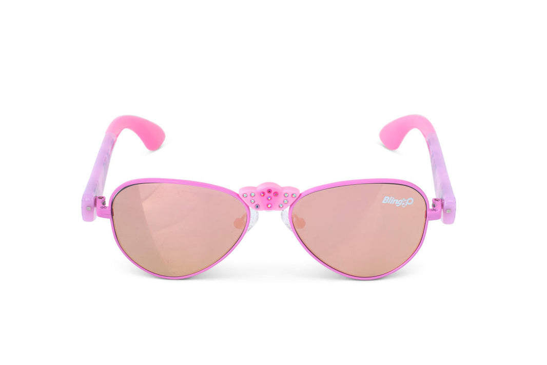 The Bling2O Girls’ Hampton Beach Sunglasses feature pink and purple frames with heart-shaped details on the bridge and mirrored, UV-protected lenses, shown against a white background—perfect beach sunglasses for kids.