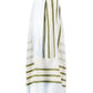 The Nia Slip Dress by Lemlem is a white sleeveless hand-woven cotton dress with green stripes and front pleats, from the Entoto Sage Collection.