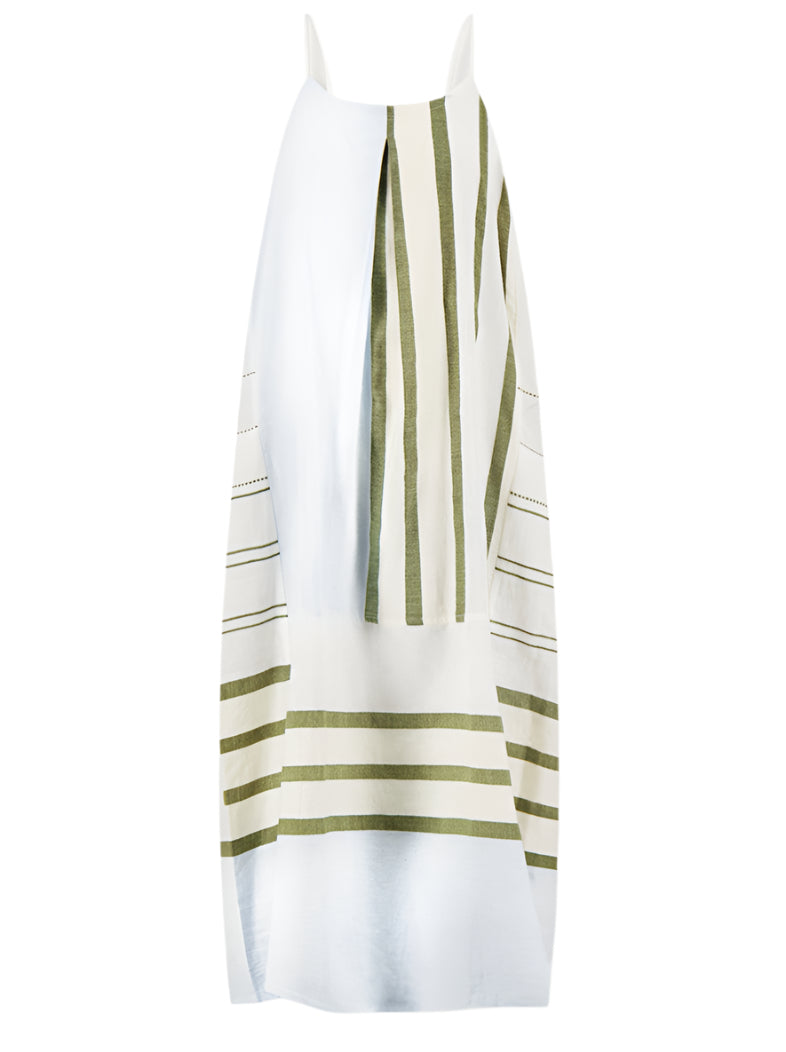 The Nia Slip Dress by Lemlem is a white sleeveless hand-woven cotton dress with green stripes and front pleats, from the Entoto Sage Collection.