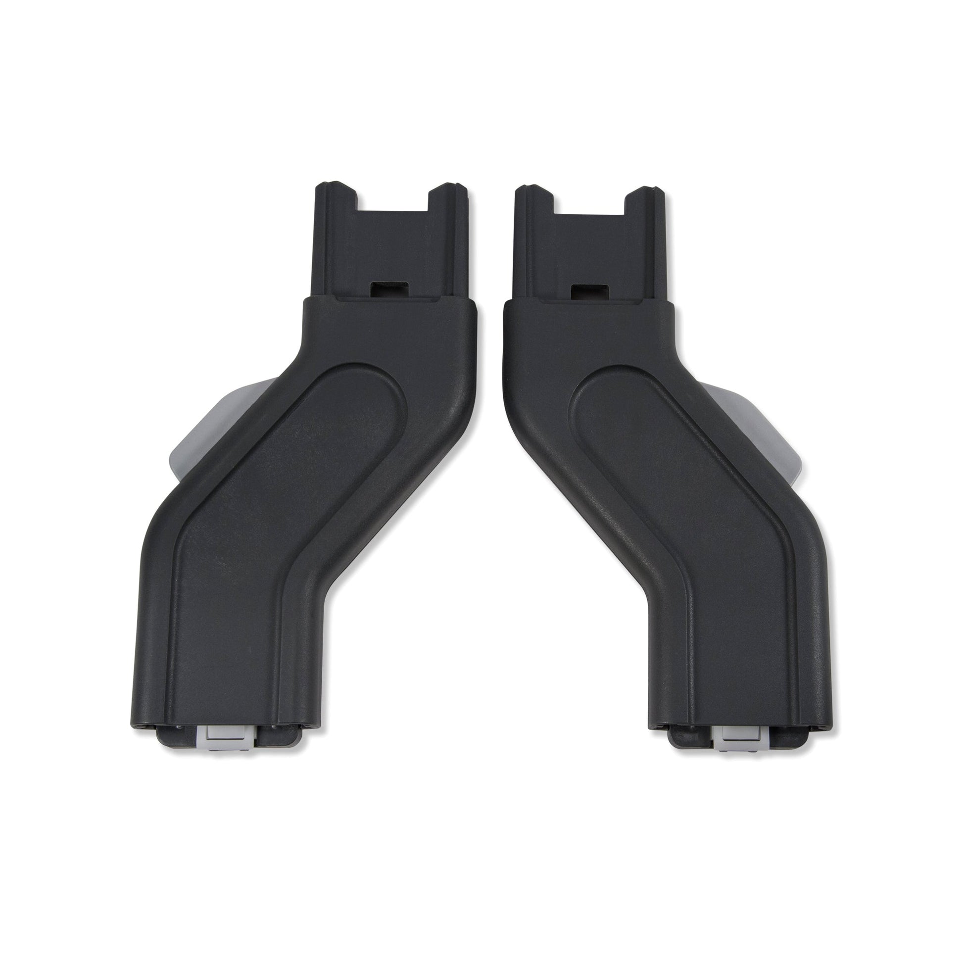 Two black, L-shaped plastic brackets with grooves, crafted as mirror-images against a white backdrop, function as UPPAbaby Upper Adapters for VISTA strollers, integrating smoothly into the stroller folds.