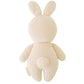 The Cuddle + Kind Baby Rabbit - Oatmeal is a hand-knit, cream-colored stuffed bunny shown from the back, featuring long ears and a round tail—an heirloom-quality toy perfect for little ones.